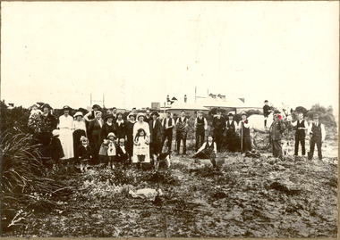 P01029 Chelsea State School men with spades planting a garden