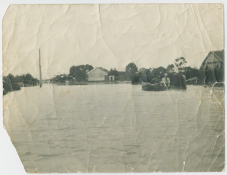 P00062 Men in Lifeboat taking supplies to Wells Rd farms 1934