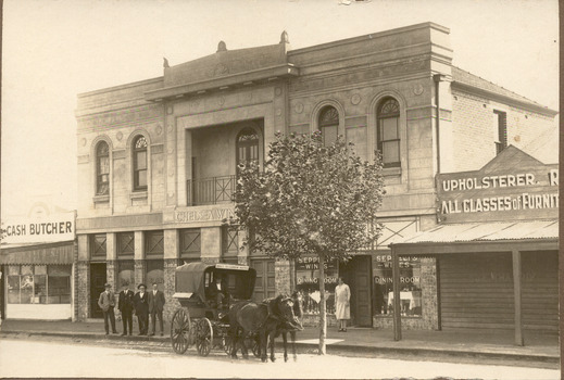 P00112 Chelsea Wine Saloon Butcher Upholsterer street scene C1920
