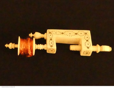 Tool - Ivory sewing clamp with winding netting reel