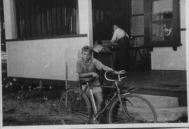 000051 - Photograph - 10 The Crescent 1940 -  Geoff Howsam with bicycle, Les G Howsam counting money