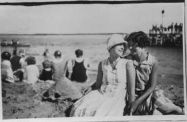 000086 - Photograph - Inverloch beach and pier c.1928 - Jean Richmond and Jess Robertson  in foreground- M Rixon