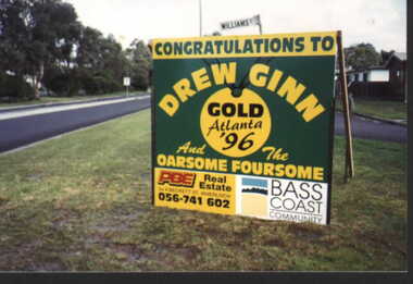 000185 - Photograph - August 1996 - Welcome sign for 1986 Olympic Gold Medallists - Drew Ginn & Oarsome - Williams St Inverloch