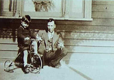 000255 - Photograph - 1937 - Pound Creek - George Henderson 1898-1969  with his son John Henderson 2 years 8 months - E Henderson