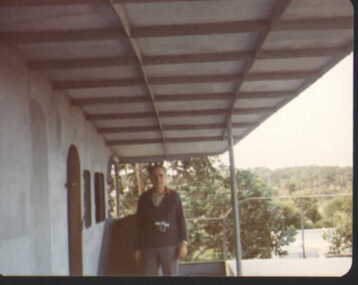 005639 Photograph - Les Thompson - builder of catamaran Llinase at Inverloch - on the upper deck of Llinase