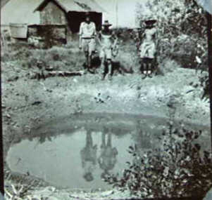 000546 - Photograph - Bomb Crater - Tack Fred - Danny - C Newton