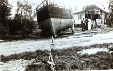 000580 - Photograph - July 1951 - Ripple  - in Abbott St - being launched