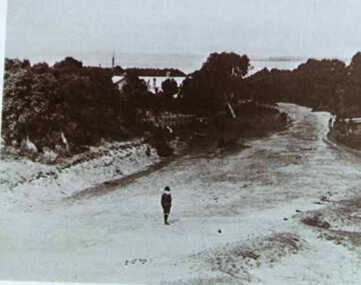000805 - Photograph - Road to beach - Boy walking on beach road - Coastal Retreat - Nancye Durham