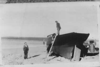 000583 - Photograph - July 1951 - Ripple 1 on beach prior to launching, Inverloch - Bill Young and others - From Bob Young