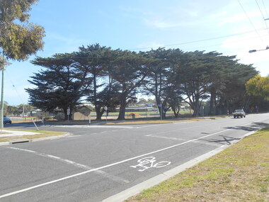 004363 - Photographs - 2018 - Cypress Pine trees at Inverloch Recreational Reserve showing the space before and after the trees were removed - from John Hutchinson