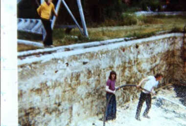 000668 - Photograph - 1976 - Inverloch - Pine Lodge Swimming pool being cleaned by Fire Brigade - Geoff Deacon & Wife - from N Deacon