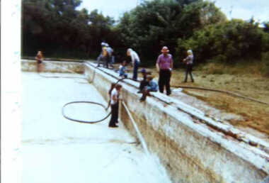 000669 - Photograph - 1976 - Inverloch - Pine Lodge Swimming pool being cleaned by Fire Brigade - from N Deacon