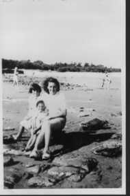 000919 - Photograph - 1942 - Inverloch - Hazel Nash (later Swift) - aged 19 years with two nieces on beach - from Hazel Swift
