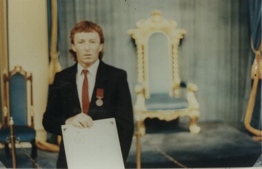 000923 - Photograph - 2nd November 1989 - Melbourne - Gary Swift with Royal Humane Society Medal at Government House - from Hazel Swift
