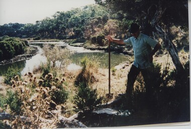 000927 - Photograph - Screw Creek, Inverloch - Sage searching for Nicholson's treasure - from Doug Boston, Korumburra Historical Society