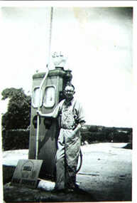 000999 -c1930s -  Photograph - Inverloch - Pine Lodge - Calvert Wyeth at Pine Lodge petrol pump - from James Wyeth