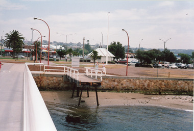 Color photograph of demolished footbridge