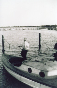 Photograph - Small boat at Jetty, Lakes Entrance 1942, Buckland