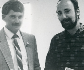 Photograph of Tambo Shire Councilor Barry Secomb with new Australian Citizen Graeme Ellis