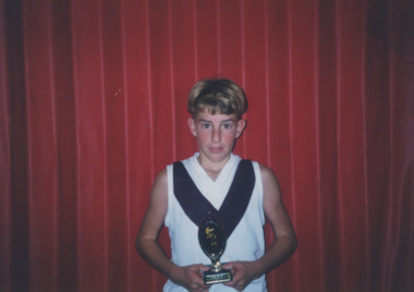 Photograph - Lakes Entrance Junior Football Club, Andrew Fearnley Memorial Trophy winner, Joel Waters  2000, Lakes Post Newspaper