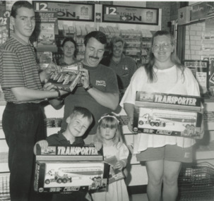 Photograph - BP Service Station Mark Watson, Melissa Webster, and owner Ross Guarnaecia with customers Lakes Entrance Victoria, Lakes Post Newspaper, 1996