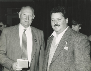 Photograph - George Browne president and Dr. Mark Rayner, Lakes Post Newspaper, 1/10/1994 12:00:00 AM