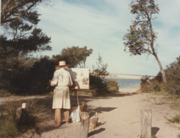 Photograph - Neil Douglas artist painting a scene towards the entrance of Lakes Bunga Victoria, M Fish, 1980c