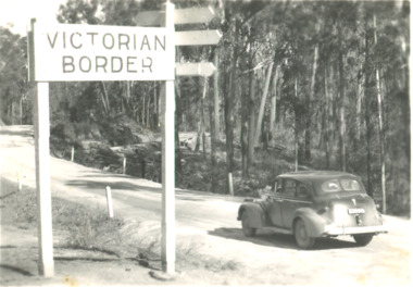 Postcard, Victorian Border sign East Gippsland Victoria, 1940 c