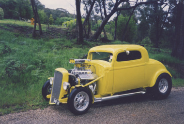 Photograph - Buskers Harvest Festival, Lakes Entrance Victoria, Rosemary Kavedis, Hotrod registration number BAD 34, 1/05/2000 12:00:00 AM