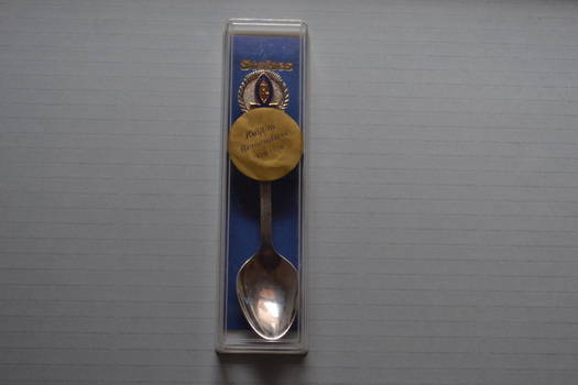 Souvenir teaspoon in clear plastic presentation box.