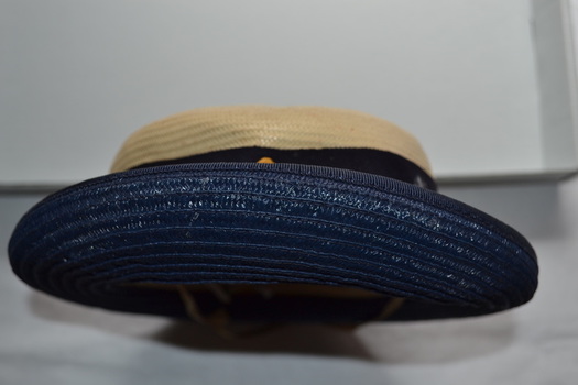 side view showing blue underside of hat brim
