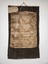 Image of the verso of the thangka, with significant water damage evident