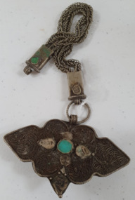 Image of brass and turquoise pendant on chain