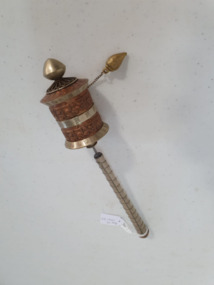 Image of hand-held prayer wheel