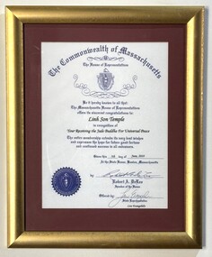 A certificate from the Commonwealth of Massachusetts congratulating the Linh Son Temple in recognition of receiving the Jade Buddha