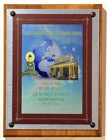 Plaque from Lien-Hoa Temple with image of the Jade Budda, world and temple