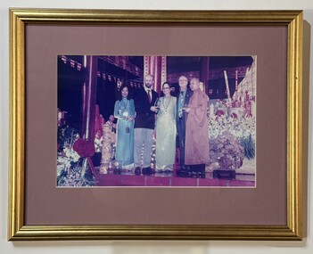 Framed image of Mai Thi Thu Dung, Australian Ambassador Allaster Cox, Judy Green, Ian Green and the Abbot of Phat Tich Monastery at opening ceremony