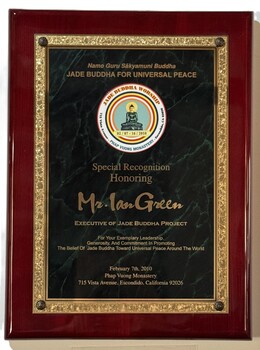 Plaque honoring Ian Green for his exemplary leadership, generosity, and commitment in promoting the belief of Jade Buddha toward universal peace around the world.