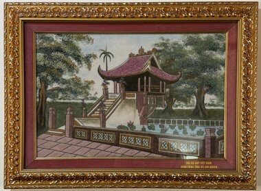 Framed artwork of one pillar pagoda made from sand 