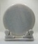 Back of marble souvenir plate on marble stand with print of the Jade Buddha