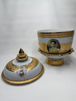 Decorative vase with images and inscription with lid removed