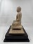 Image of side of wooden statue of the Buddha