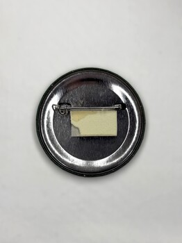 Back of badge of Jade Buddha