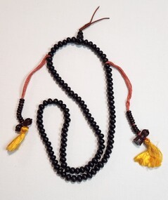 Memorabilia - Long mala with dorje, half dorje and yellow tassels