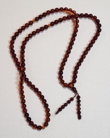 Memorabilia - Long mala with three divider beads and two tassels each with five beads