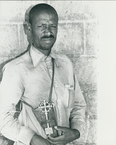 Photograph, Father Shimuye Mebratu with his silver Orthodox cross, 20/02/1985