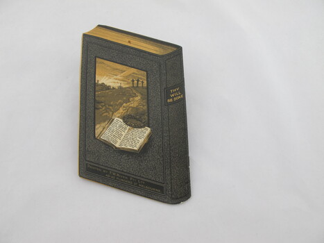 This is a coloured program cleverly designed and produced to resemble a three dimentional book. 