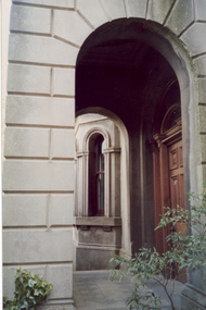 Arched entrance to portico