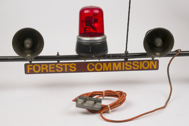 Red flashing light and sirens mounted on car rooftop rack