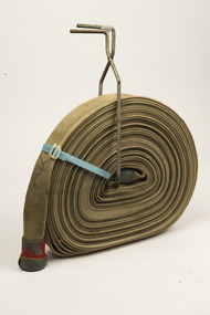 Canvas fire hose and roll carrier